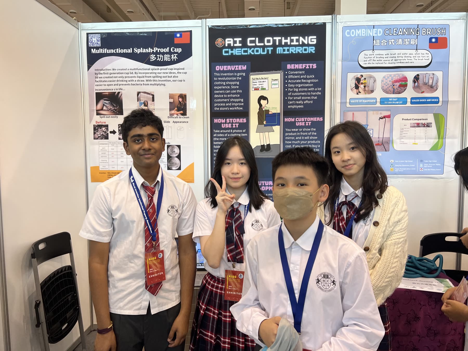 Students in front of the AI Clothing Checkout Mirror poster at KIDE 2024